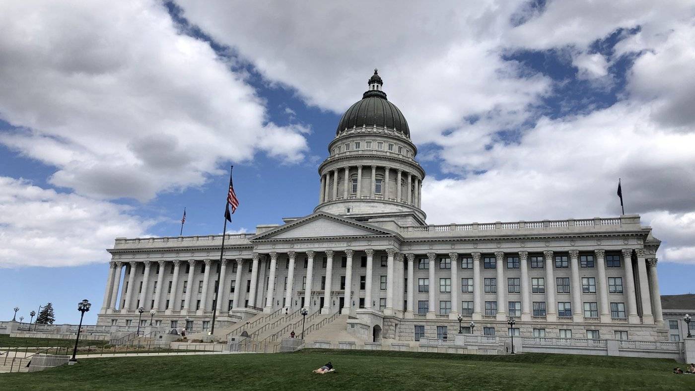 The Utah State Capitol under a partly cloudy sky